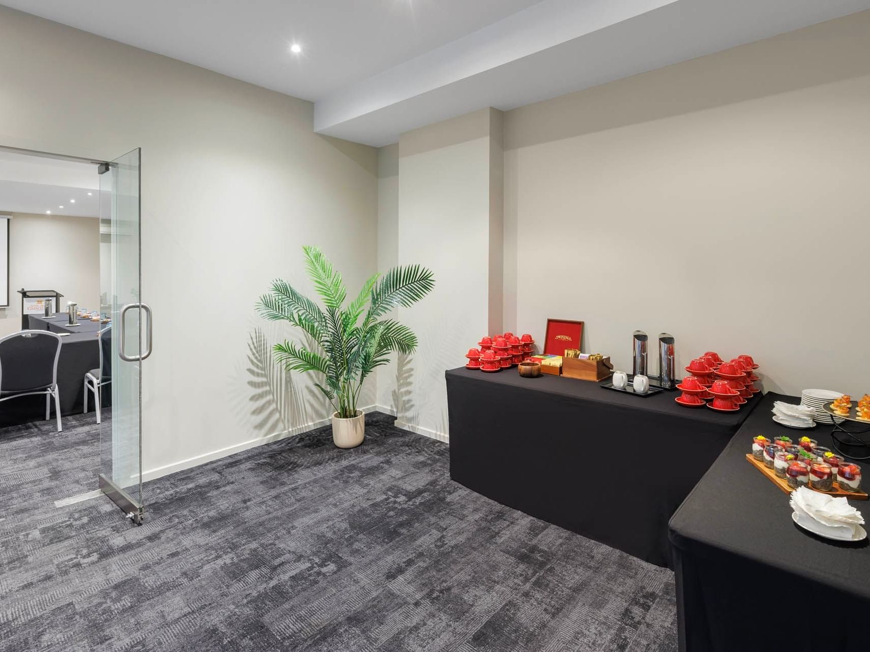 Refreshment tables arranged in a venue at Grand Chancellor Melbourne