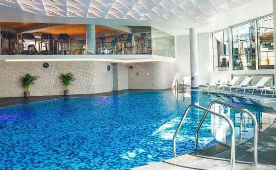 An indoor hotel pool at Ana Hotels in Romania