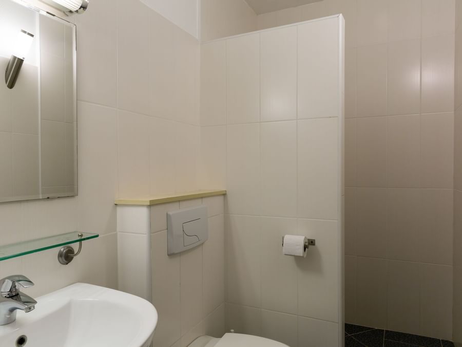 Bathroom vanity in bedrooms at Hotel La Dousseine