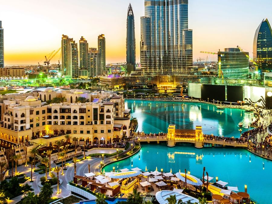 Dubai Mall and cityscape with illuminated buildings near DAMAC Hotels & Resorts