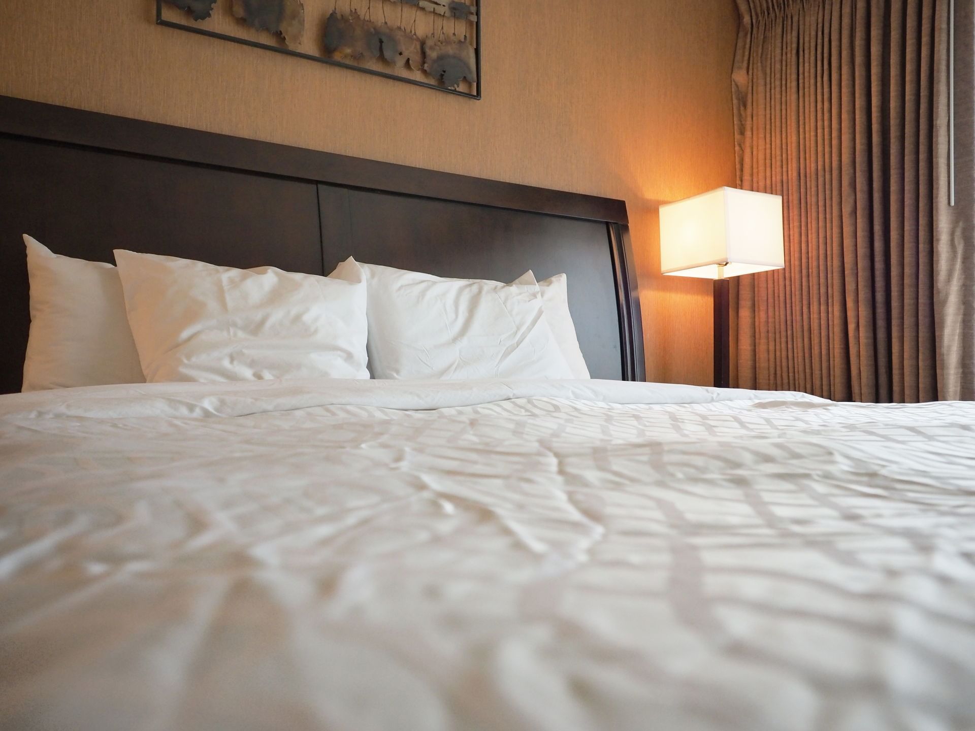 Bedroom arrangement in Deluxe Suite at Evergreen Resort