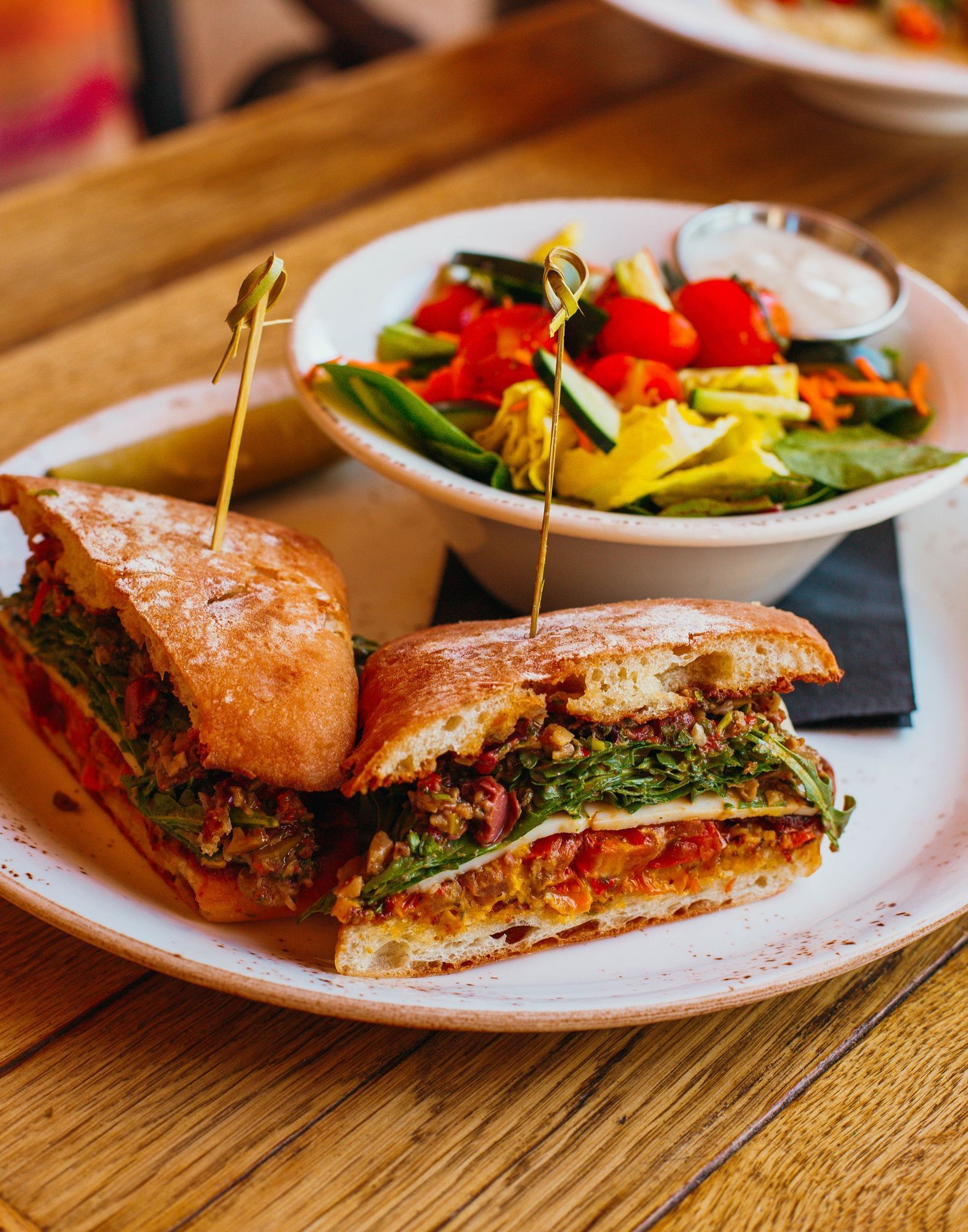 Lorem ipsum Plated sandwich with a salad on the side