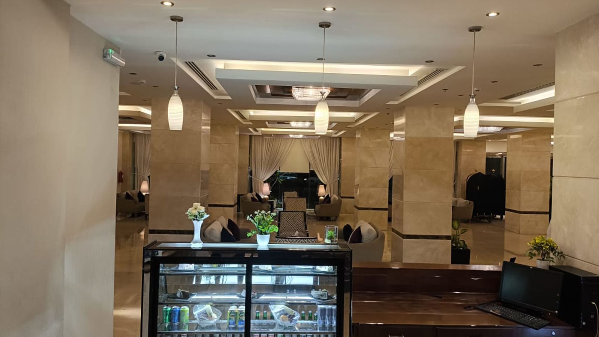 A case filled with pastries and bottled in the Coffee shop at Warwick Hotels & Resorts