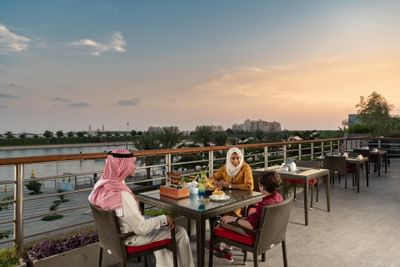 A family dining at the Veranda in Bay La Sun Hotel & Marina