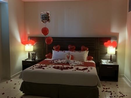 a bed covered in roses