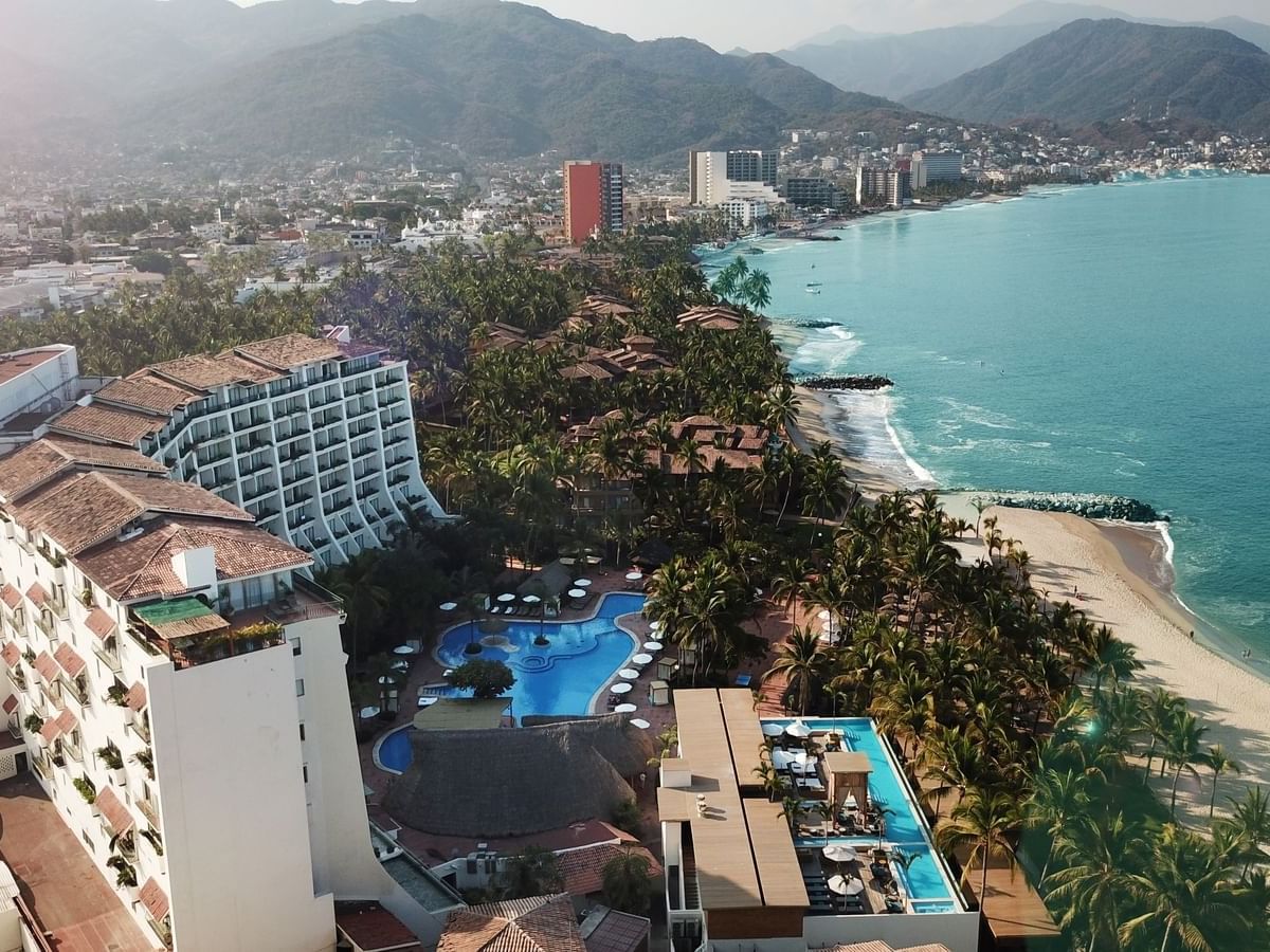 Aerial view of hotel and pool near beach of Puerto Vallarta