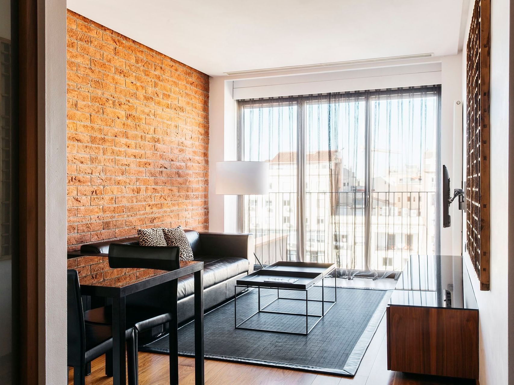 Living room of Deluxe suite at Barcelona Apartments