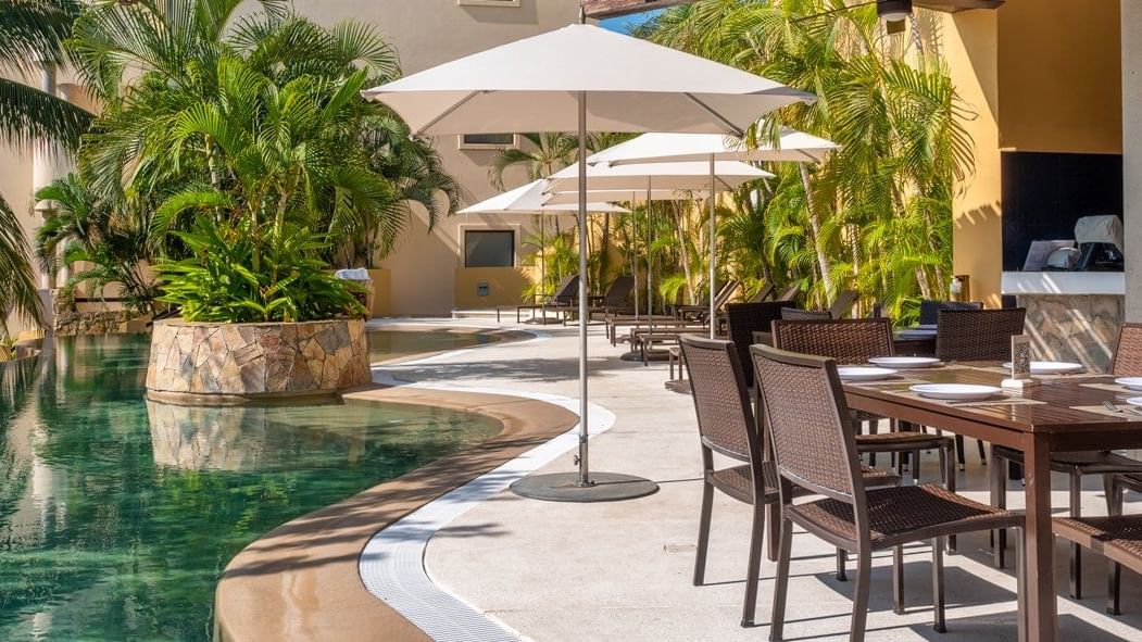 Restaurant Manglares by the pool at Celeste Beach CC Hotel