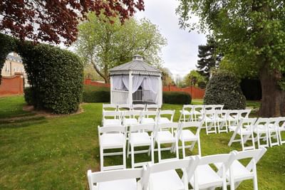 White chairs arranged for a wedding at Orsett Hall Hotel