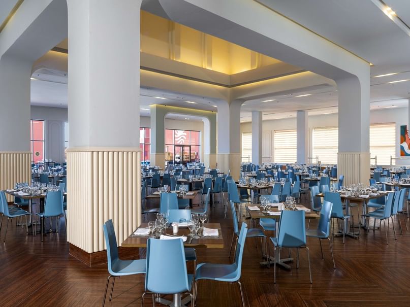 A large dining area with tables and chairs at Pickalbatros Laguna Vista Hotel in South Sinai Governorate.