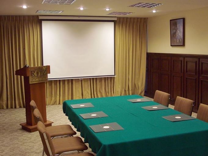 Table setup in a meeting room at Ritz Apart Hotel