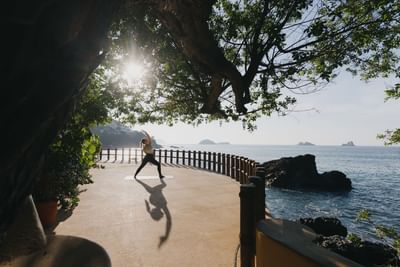 Lady doing exercise on the deck at Cala de Mar