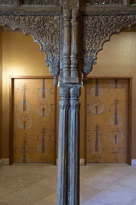 Lorem ipsum A wood detail which makes up some of the hallways arches