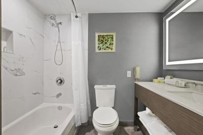 Interior of a bathroom with a bathtub at Best Western Premier