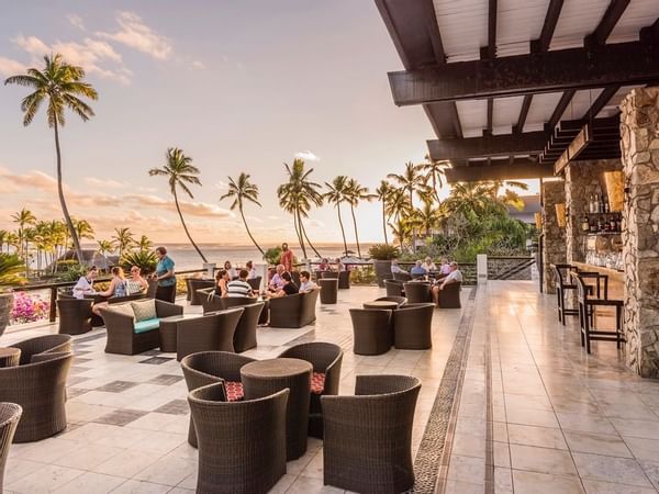 View of the open Sunset Terrace Lounge area at Warwick Fiji