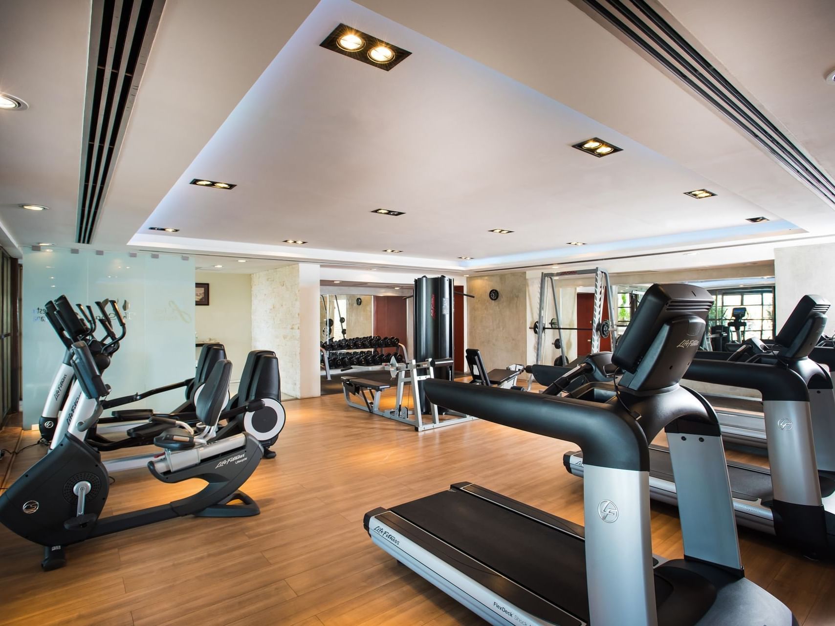 A fitness center with equipment at La Colección Resorts