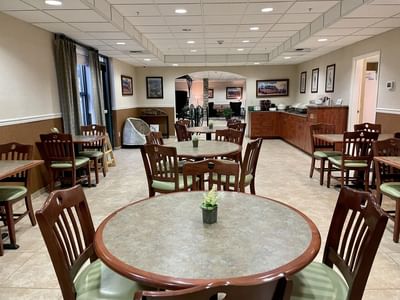 Tables & chairs arrangement in the Dining Room at Boothill Inn & Suites