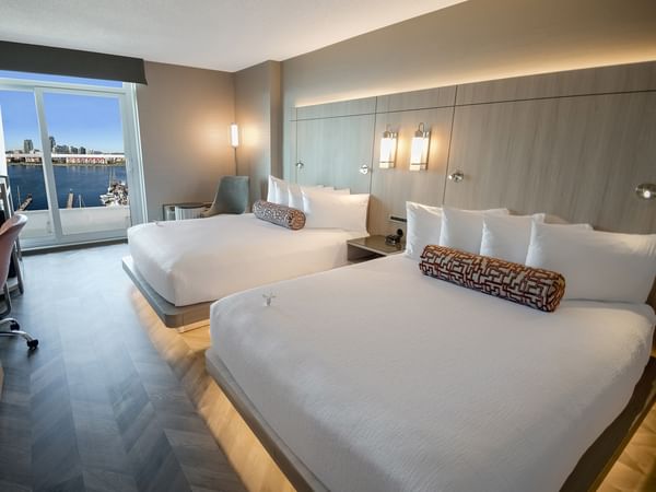 A hotel room with two queen beds at Coast Victoria Hotel & Marina by APA