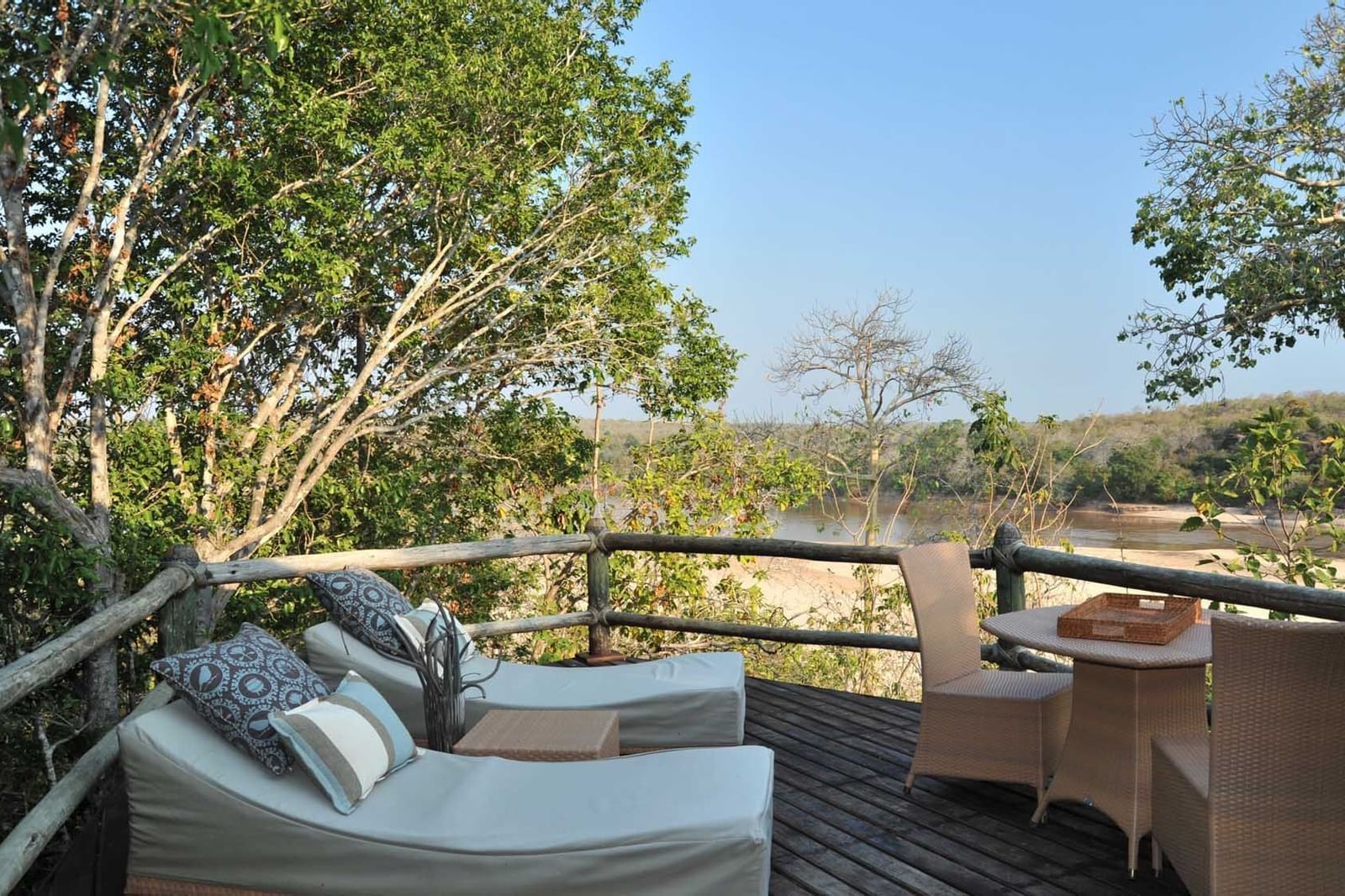 A Balcony lounge in a hotel room at Serena Mivumo River Lodge