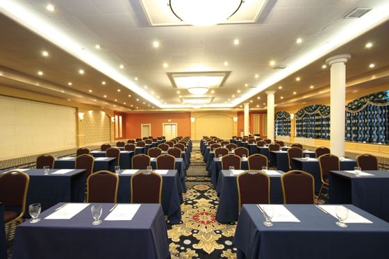 Tables set up in a ballroom