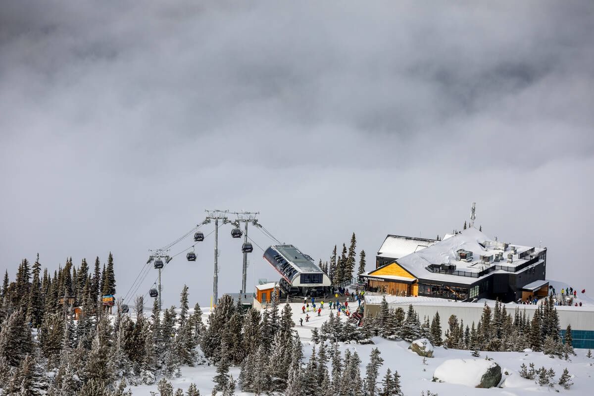 Aerial view of the hotel and activity area on snow at Blackcomb Springs Suites