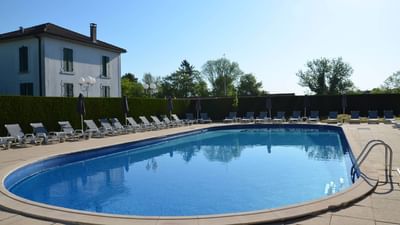 Pool at Hôtel-Club Cosmos in Contrexéville, France