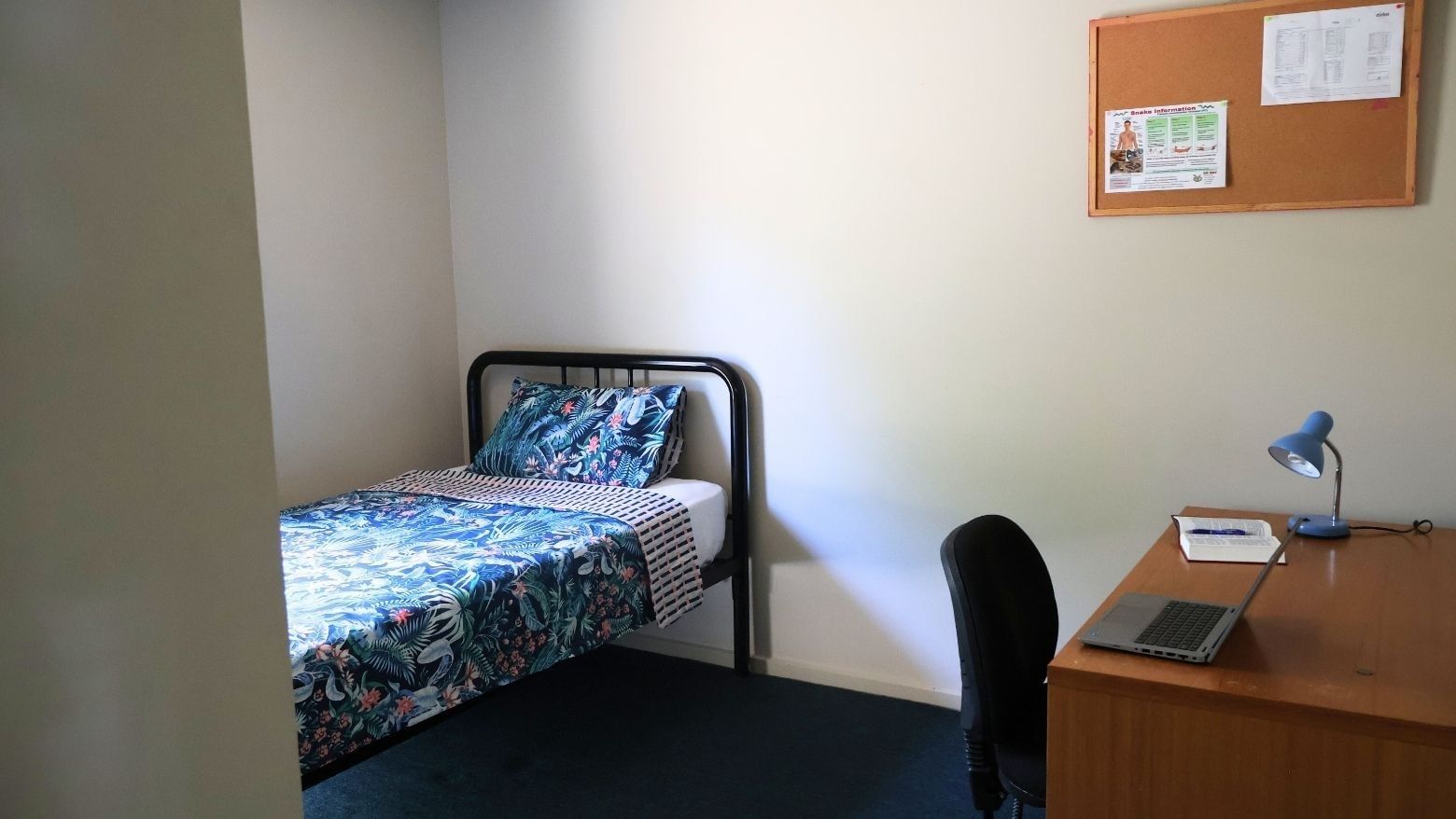 Room with bed, desk, and chair at La Trobe University - Villas.