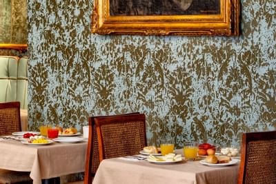 Breakfast nook arranged in a restaurant at Hotel Bisanzio