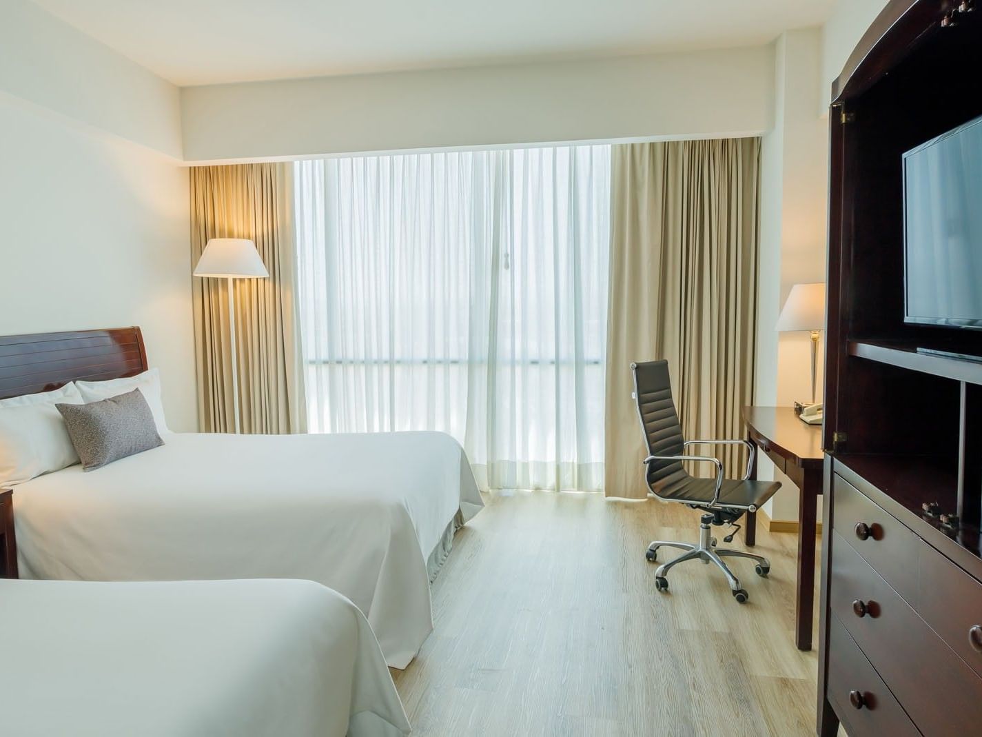 2 Double Camino Real Club featuring white linens, wooden furniture, and garden views at Camino Real Pachuca