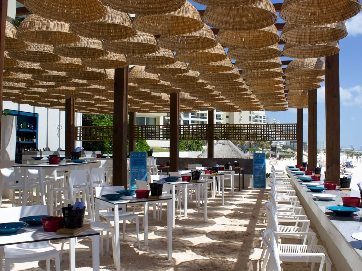outdoor restaurant dining area with tables and chairs
