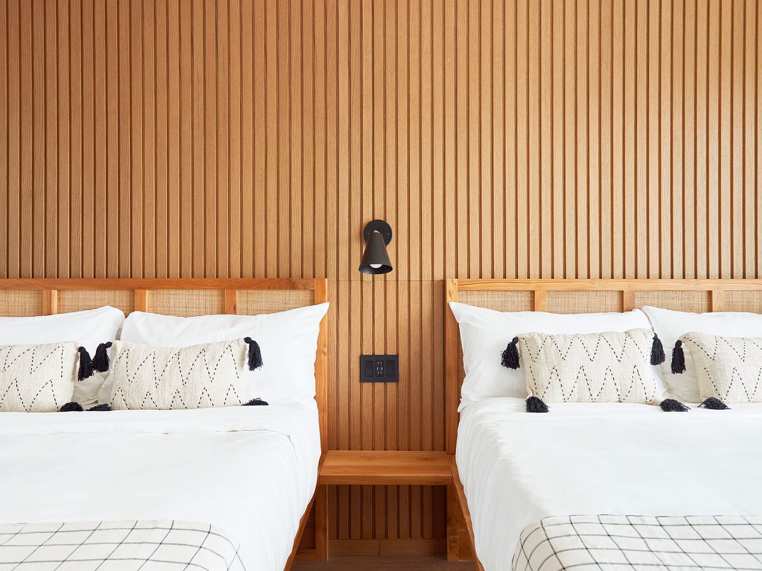 Cozy beds at Deluxe Two Queen Bay View room, The Rockaway Hotel