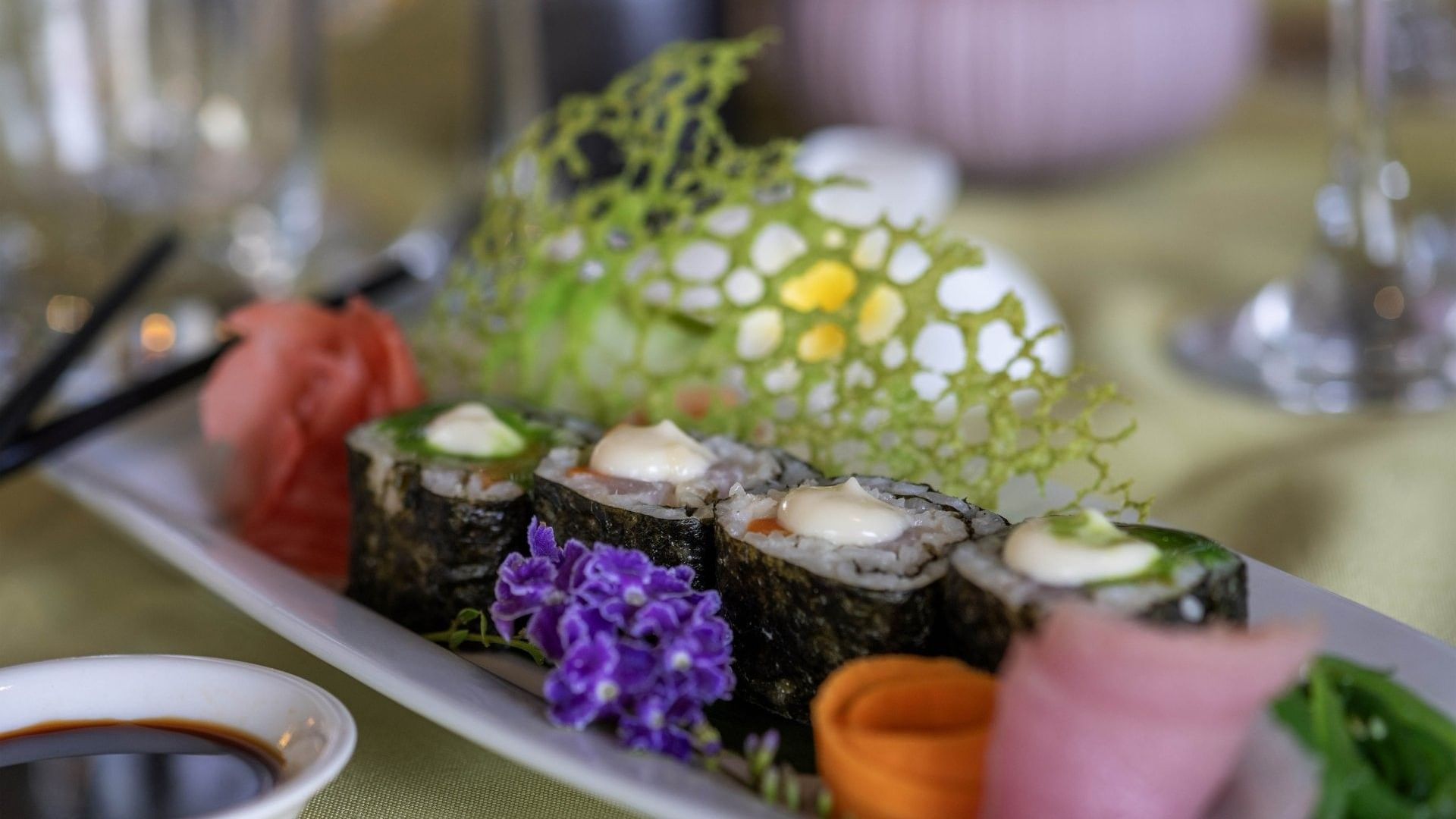 gourmet sushi roll platter garnished with purple flowers in Wild Ginger Restaurant at warwick le lagon-vanuatu