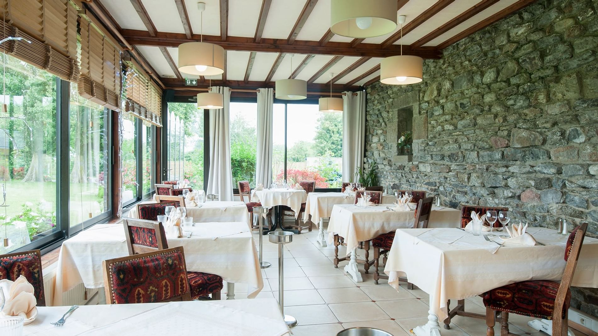 Dining area in Manoir De La Roche Torin at Originals Hotels