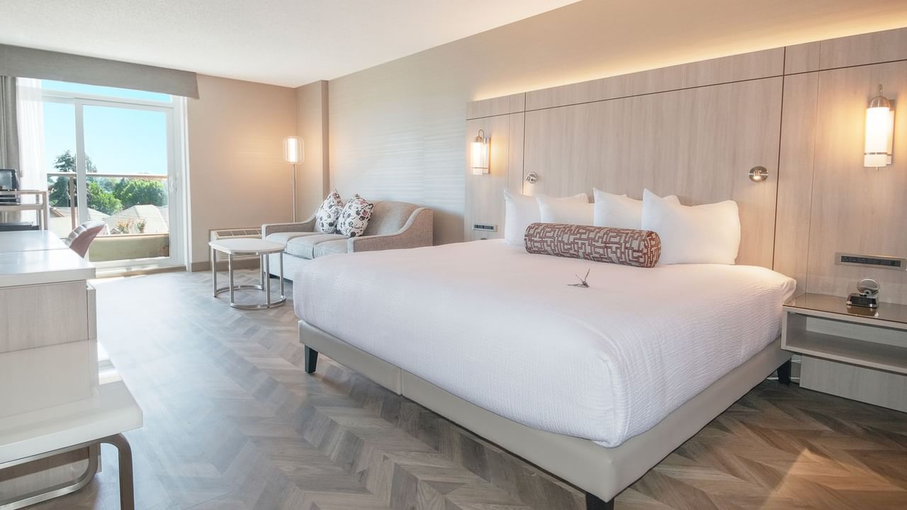 Hotel guestroom with a king size bed