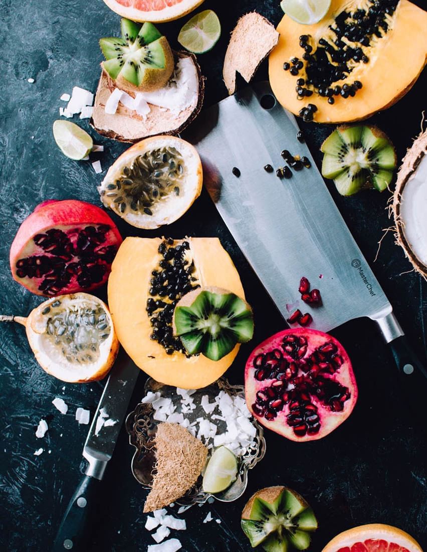 Kiwi, papaya, pomegranate, and passion fruit with knife served at Hotel Grand Chancellor Adelaide