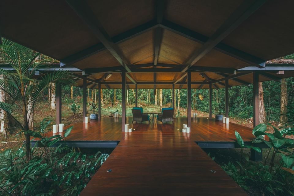 Spacious open-air pavilion with seating in Wellness Center at El Silencio Lodge & Spa