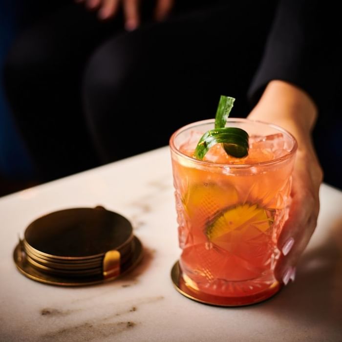 Glass of cocktail served in Meze Bar at Novotel Glen Waverley