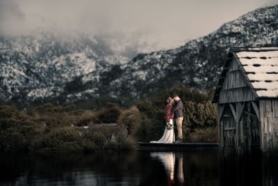 Portrait of a Bride & Groom by Dove lake near Cradle Mountain