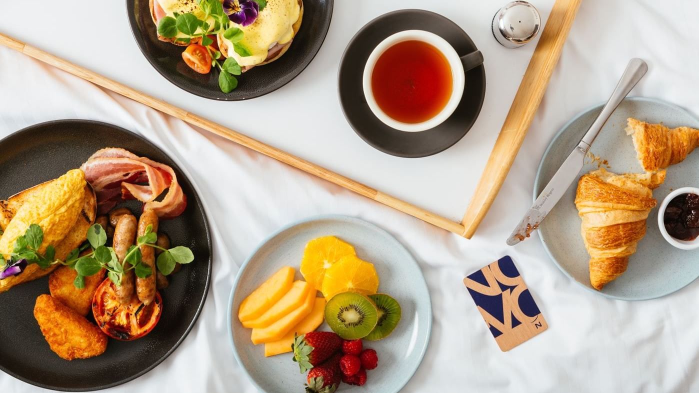 Breakfast served on the bed in a Room at Novotel Glen Waverley