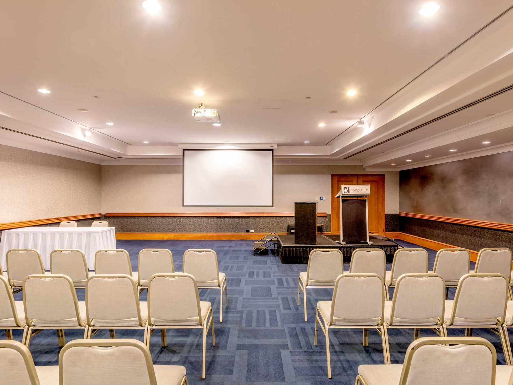 Meeting Room arranged with white chairs at  Duxton Hotel Perth