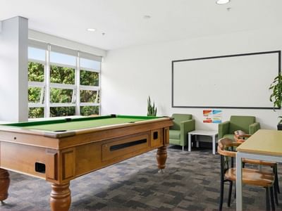Pool table and seating in Student Living Auckland – Anzac.