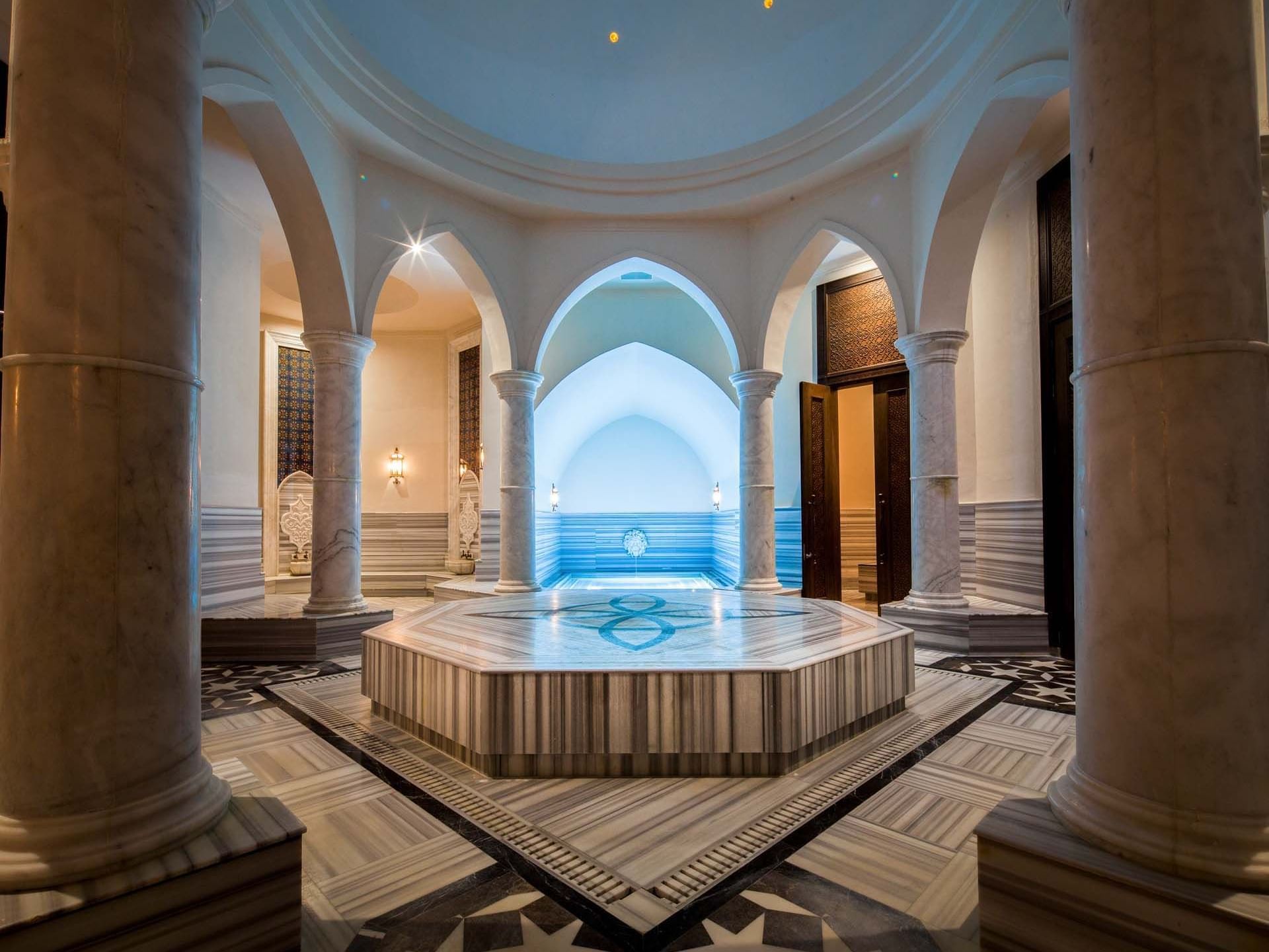 Turkish Bath area with marble columns and arches at Titanic Deluxe Golf Belek