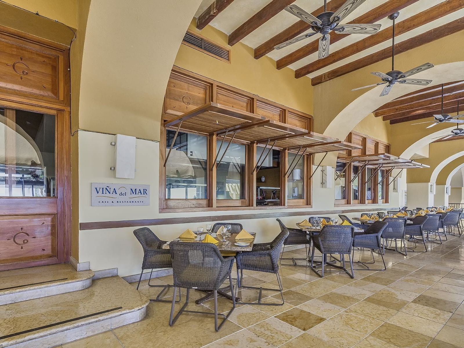 Dining tables in a restaurant at La Colección Resorts