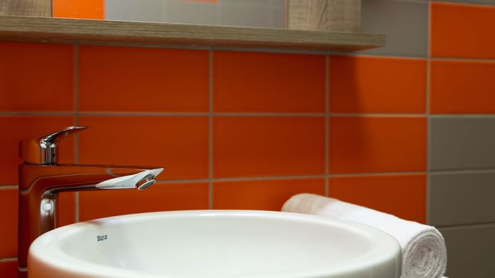 Bathroom vanity in room at Clermont-Ferrand South Aubiere