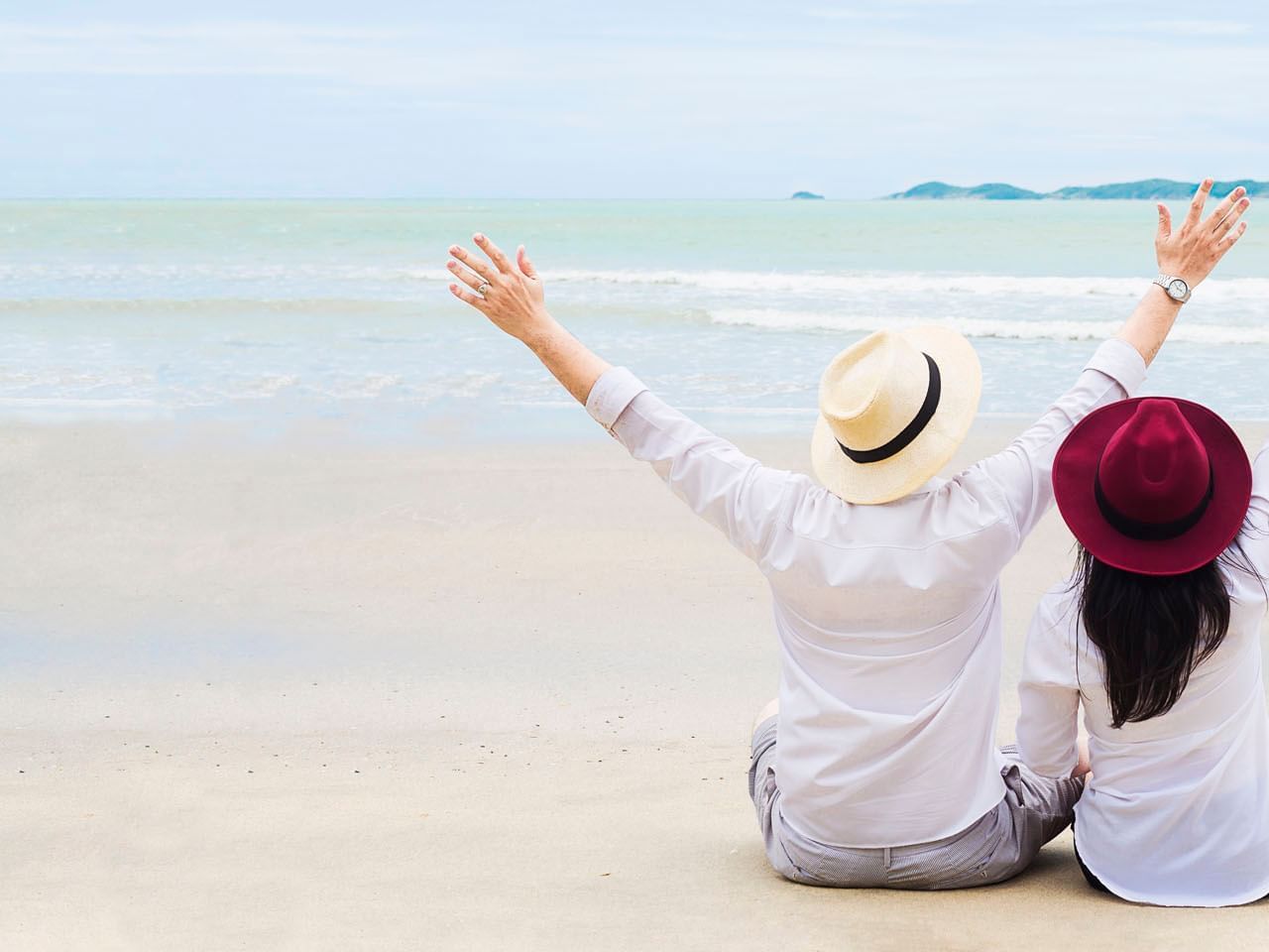 Couple sitting on the floor near at The Danna Langkawi Hotel