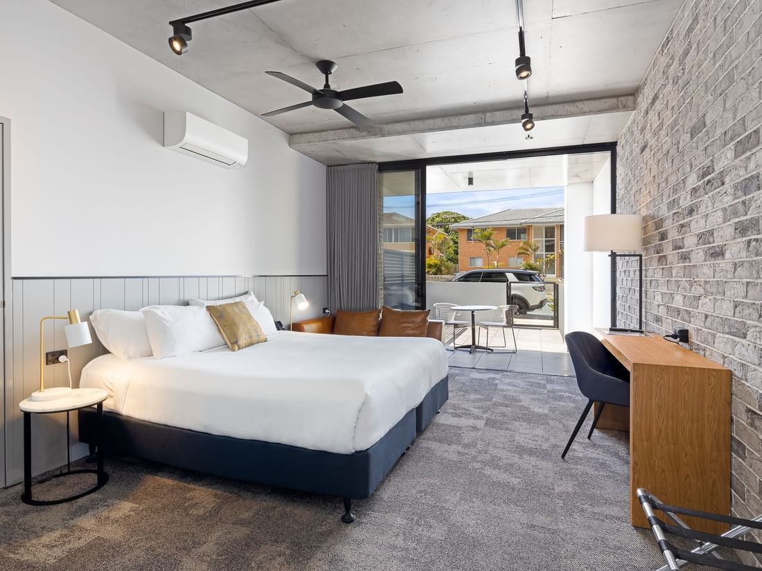 classic room bed and balcony view from kitchenette 