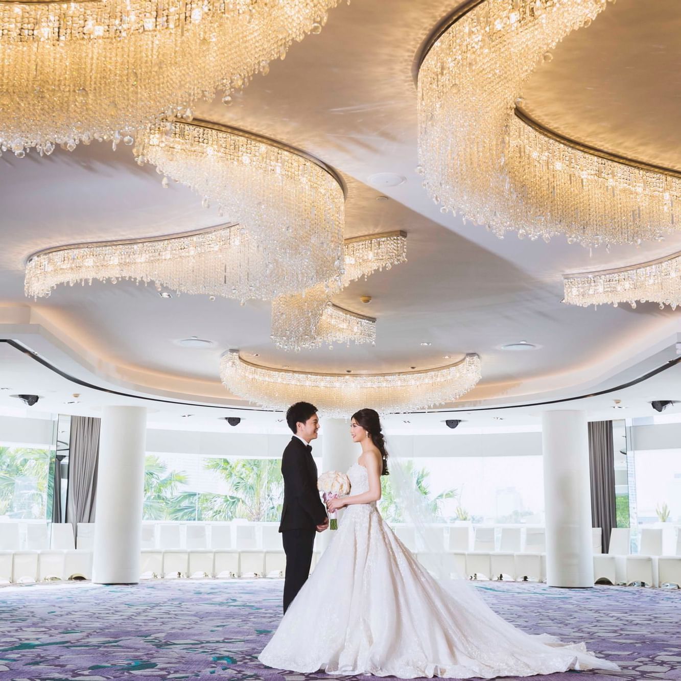 Bride & Groom in an event hall at Chatrium Hotels & Residences
