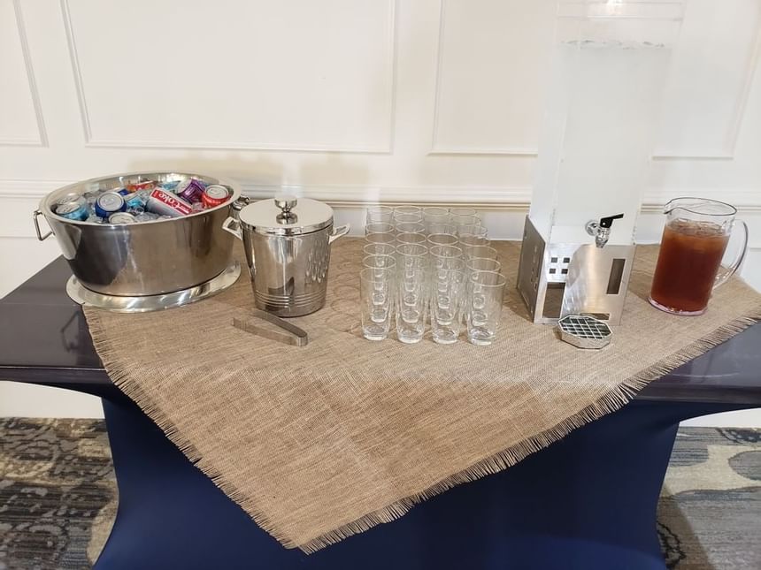 Table with coffee machine, glasses at Palmera Inn and Suites