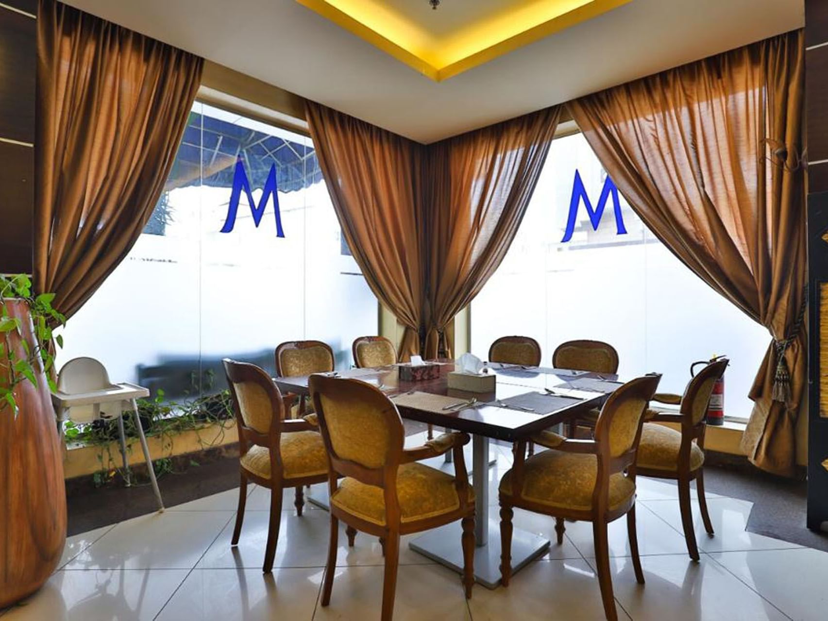 Arranged dining table in Al Dana Restaurant at Mena Hotel Taif