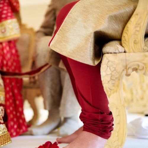 Groom sitting barefoot waiting for the Madhuparka Ceremony to be preformed